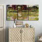 Three-panel canvas wall art featuring arched rose garden walkway, displayed above a cabinet in an entryway.