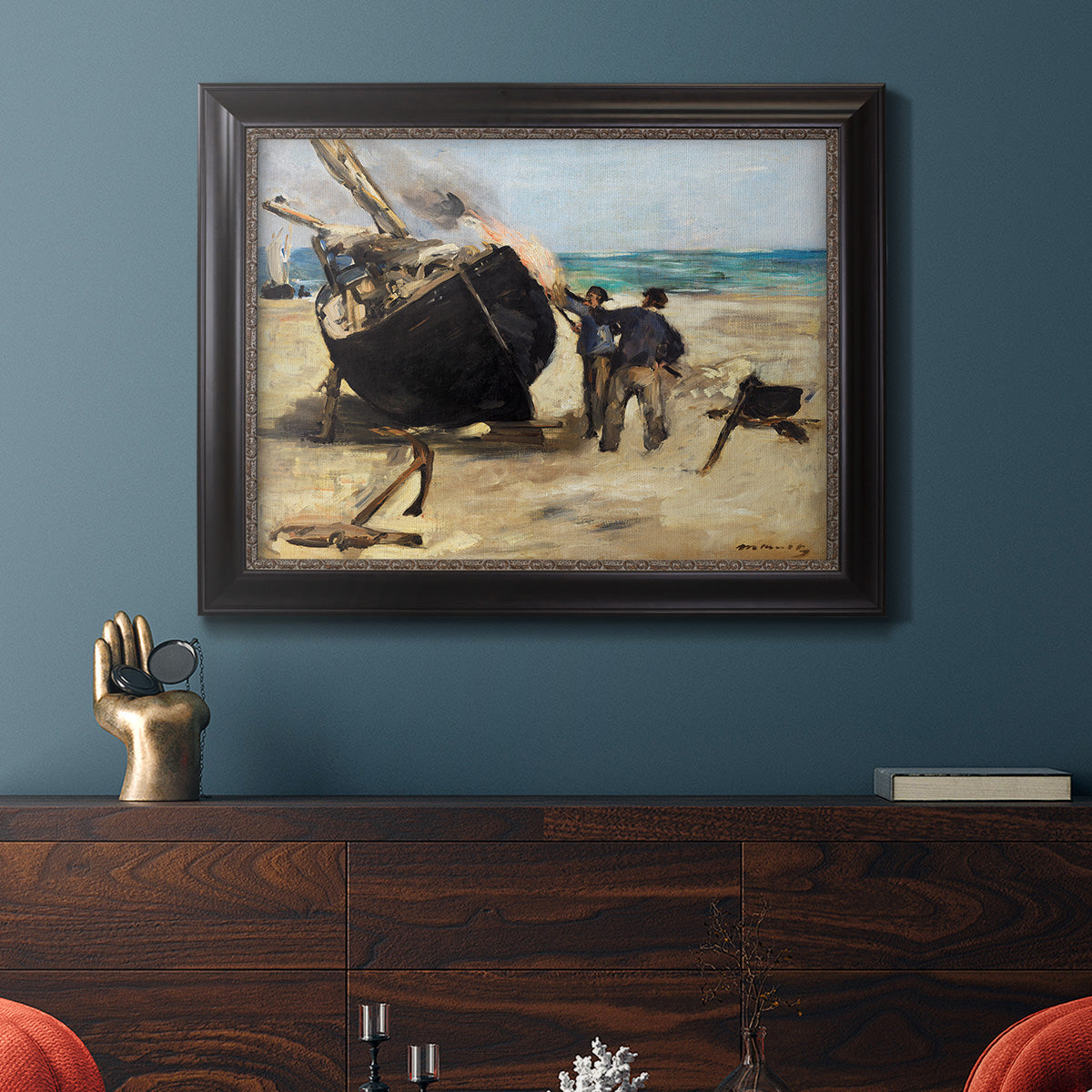 Impressionist nautical work scene by Édouard Manet in an ornate black frame with gilded inner detail displayed in a dark-toned interior setting.