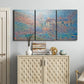 Three-panel canvas wall art featuring sunlit valley landscape, displayed above a cabinet in an entryway.