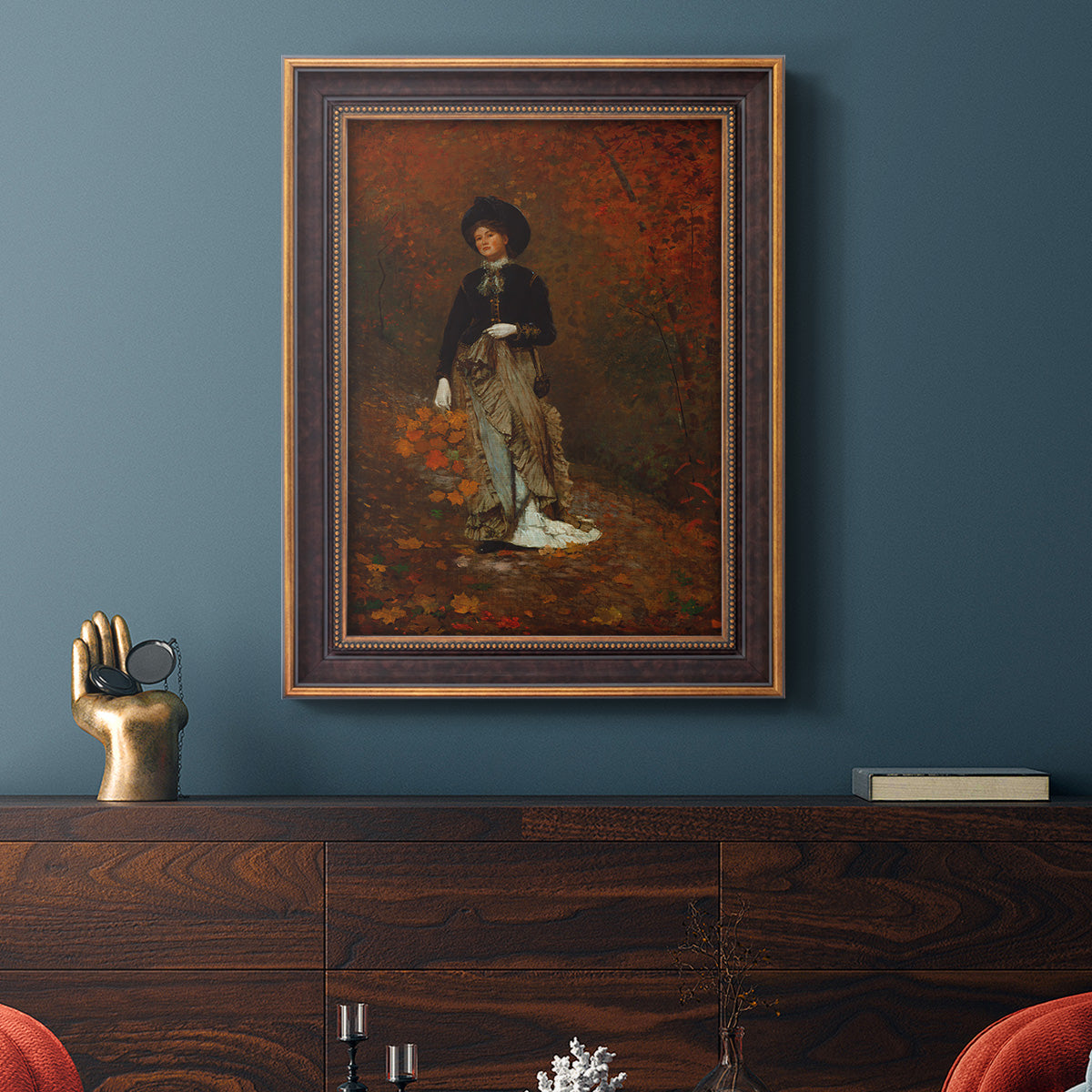 Realist autumn portrait scene by Winslow Homer in an ornate bronzed mahogany wood frame displayed in a dark-toned interior setting.