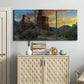 Three-panel canvas wall art featuring dramatic canyon landscape at dusk, displayed above a cabinet in an entryway.