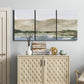 Three-panel canvas wall art featuring desert mountain landscape watercolor, displayed above a cabinet in an entryway.