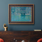 Impressionist Venetian palace waterfront scene by Claude Monet in an ornate bronzed mahogany wood frame displayed in a dark-toned interior setting.