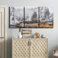 Three-panel canvas wall art featuring winter village street photography, displayed above a cabinet in an entryway.
