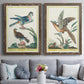 Set of two walnut barnwood framed canvas prints depicting paired atmospheric abstract paintings with soft clustered strokes, hazy edges, and spacious white fields above a sofa in a contemporary living room.