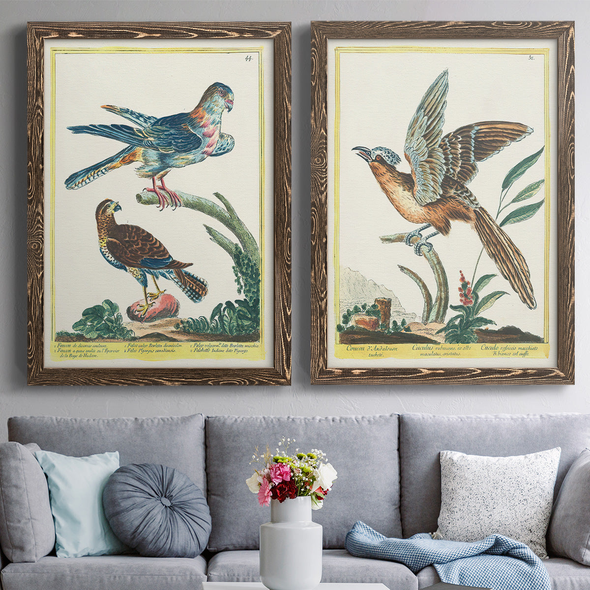 Set of two walnut barnwood framed canvas prints depicting paired atmospheric abstract paintings with soft clustered strokes, hazy edges, and spacious white fields above a sofa in a contemporary living room.