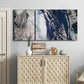 Three-panel canvas wall art featuring layered blue abstract texture, displayed above a cabinet in an entryway.