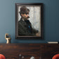 Impressionist portrait of a seated man by Édouard Manet in an ornate black frame with gilded inner detail displayed in a dark-toned interior setting.
