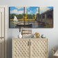 Three-panel canvas wall art featuring bridge crossing river landscape, displayed above a cabinet in an entryway.