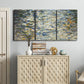 Three-panel canvas wall art featuring abstract water surface reflections, displayed above a cabinet in an entryway.