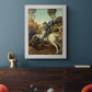 Religious painting of Saint George slaying the dragon by Raphael in an ornate weathered white frame displayed in a dark-toned interior setting.