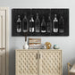 Three-panel canvas wall art featuring illustrated wine bottle cellar diagram, displayed above a cabinet in an entryway.
