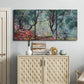 Three-panel canvas wall art featuring olive trees in sunlit garden, displayed above a cabinet in an entryway.