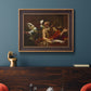 Classical religious painting of Saint Jerome with an angel by Simon Vouet in an ornate bronzed mahogany wood frame displayed in a dark-toned interior setting.
