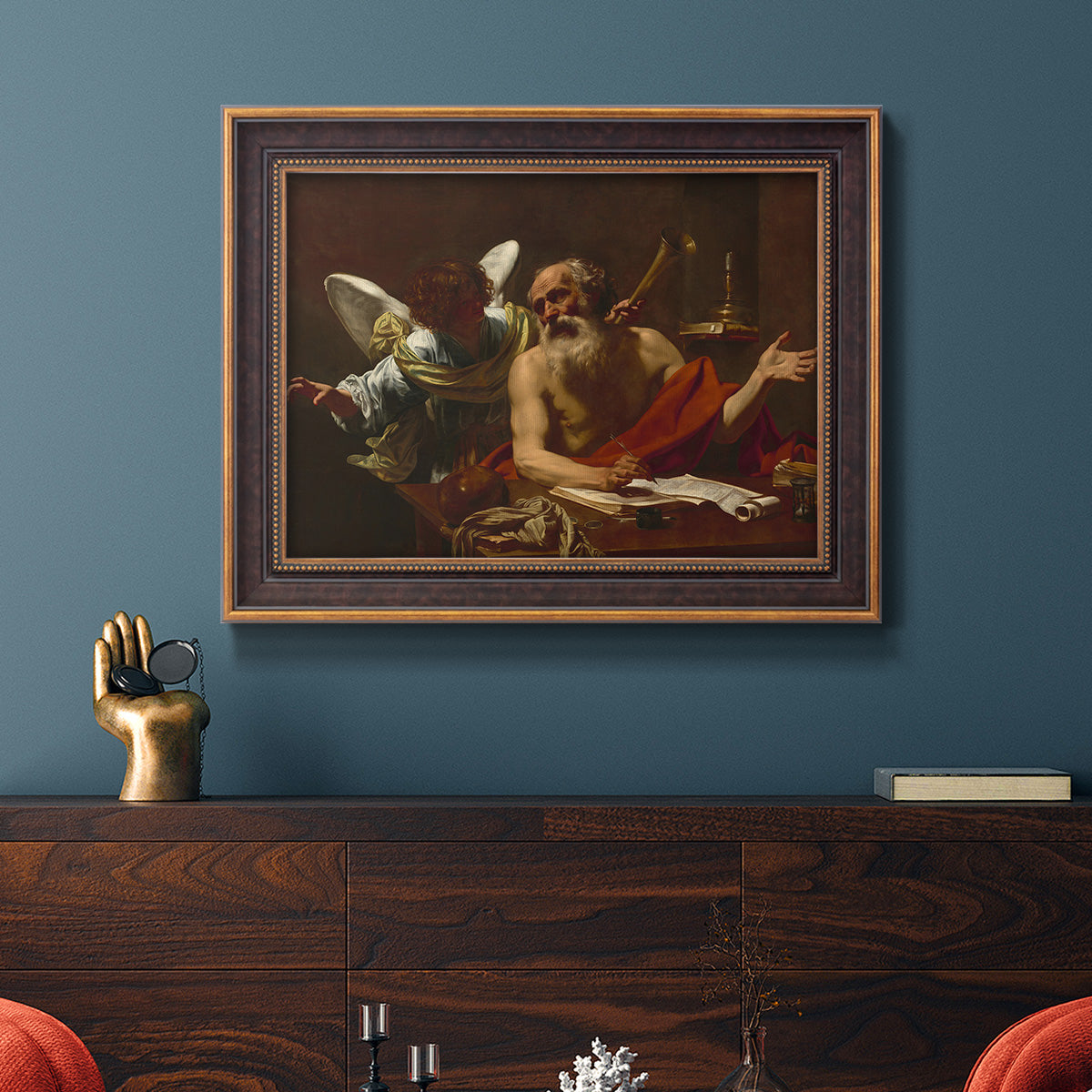 Classical religious painting of Saint Jerome with an angel by Simon Vouet in an ornate bronzed mahogany wood frame displayed in a dark-toned interior setting.