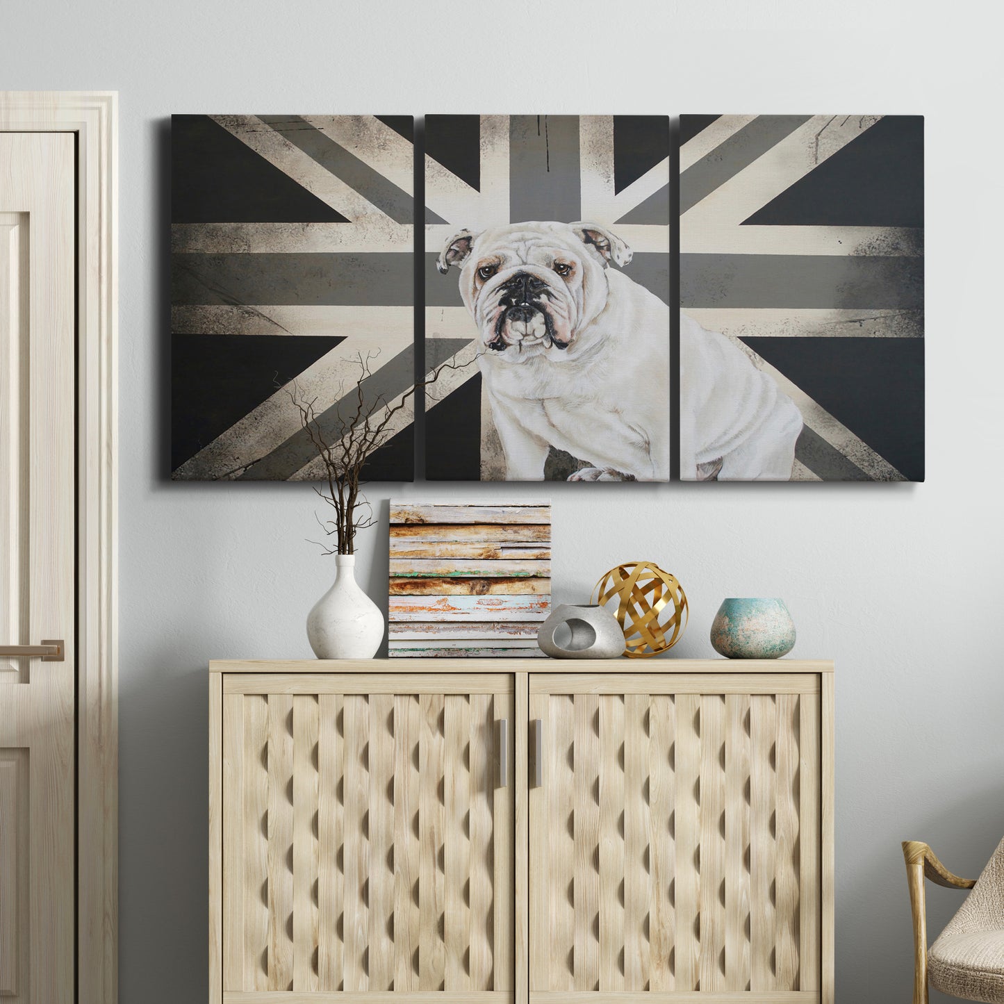Three-panel canvas wall art featuring black and white animal collage, displayed above a cabinet in an entryway.
