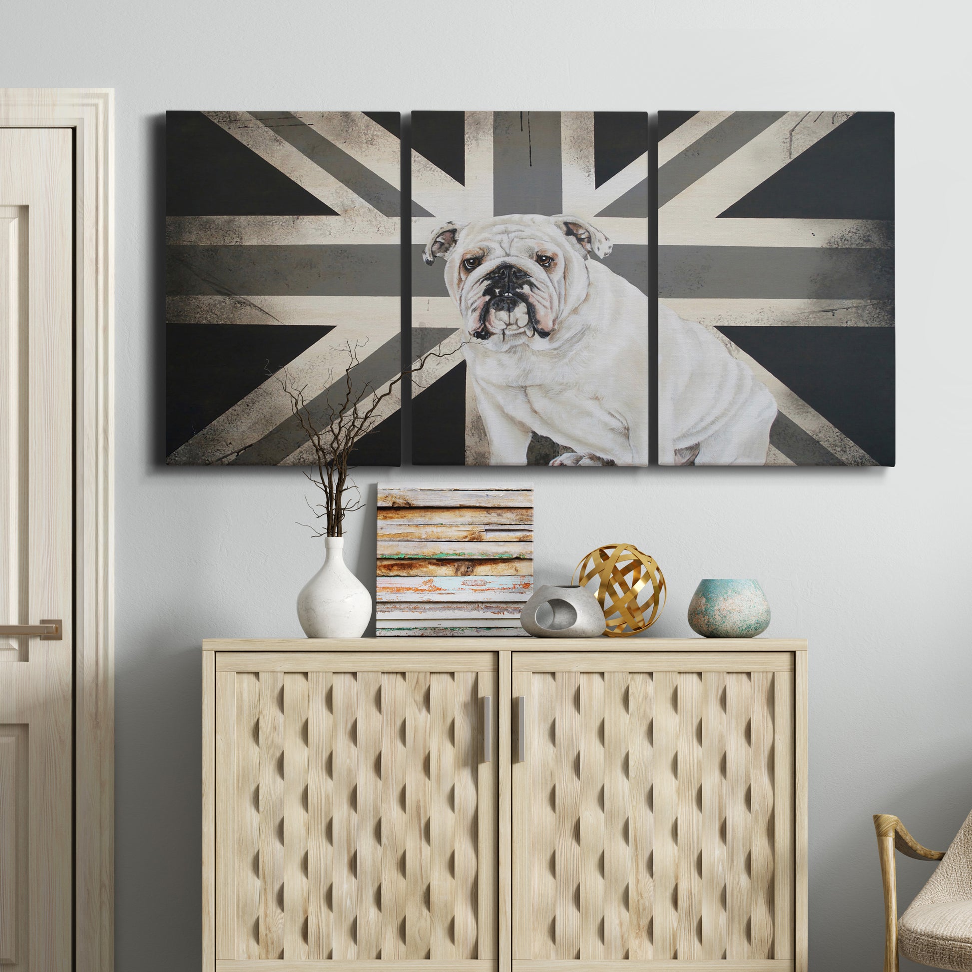 Three-panel canvas wall art featuring black and white animal collage, displayed above a cabinet in an entryway.