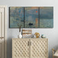 Three-panel canvas wall art featuring misty harbor sunrise with boats, displayed above a cabinet in an entryway.