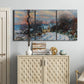 Three-panel canvas wall art featuring snow covered road leading to village, displayed above a cabinet in an entryway.