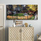 Three-panel canvas wall art featuring garden in full bloom by coast, displayed above a cabinet in an entryway.