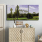 Three-panel canvas wall art featuring open landscape near le havre, displayed above a cabinet in an entryway.