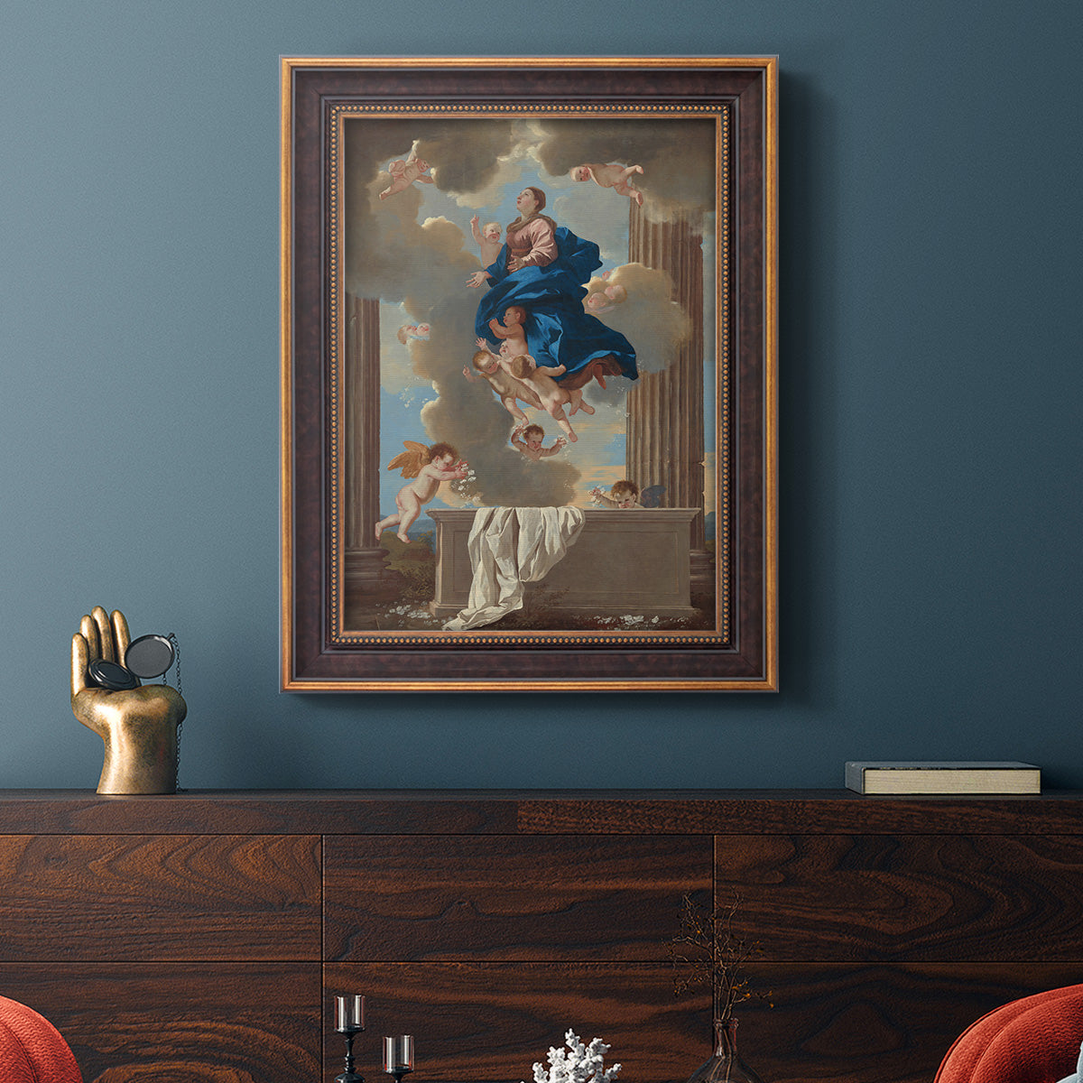 Classical religious depiction of the Assumption of the Virgin by Nicolas Poussin in an ornate bronzed mahogany wood frame displayed in a dark-toned interior setting.