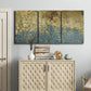 Three-panel canvas wall art featuring metallic abstract gold tones, displayed above a cabinet in an entryway.