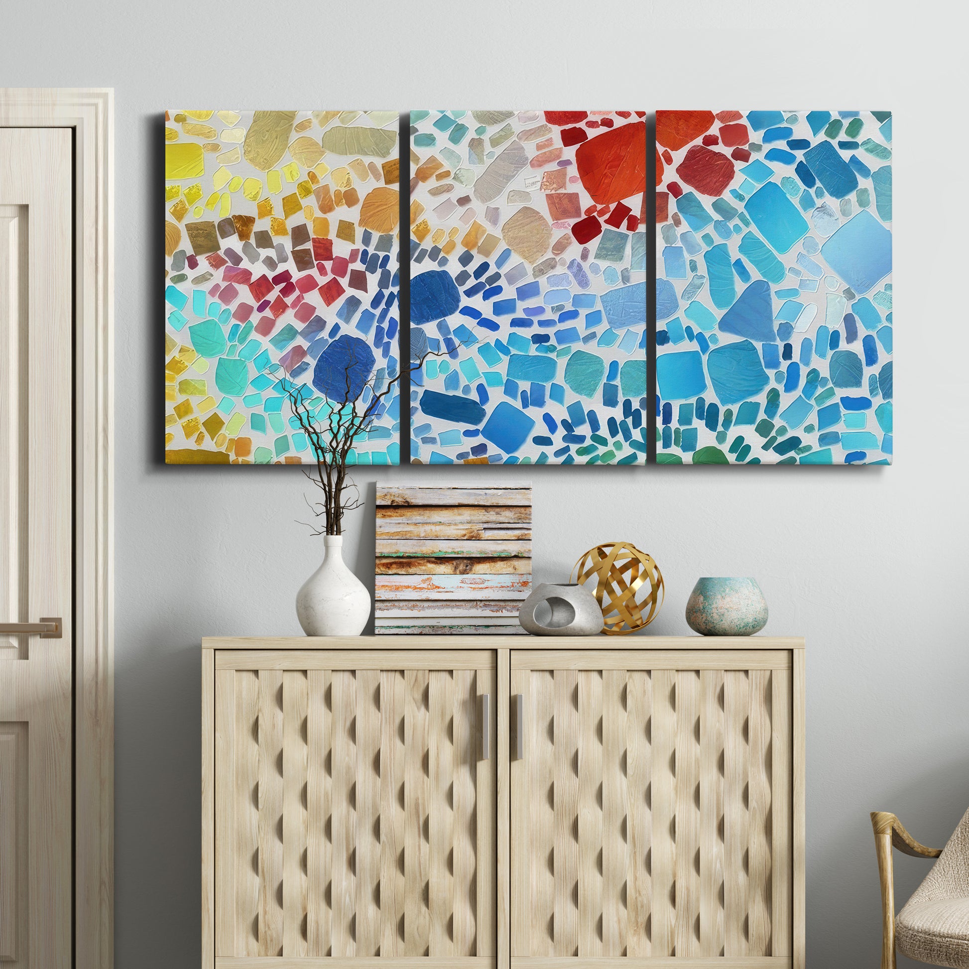 Three-panel canvas wall art featuring open landscape with landing strip, displayed above a cabinet in an entryway.