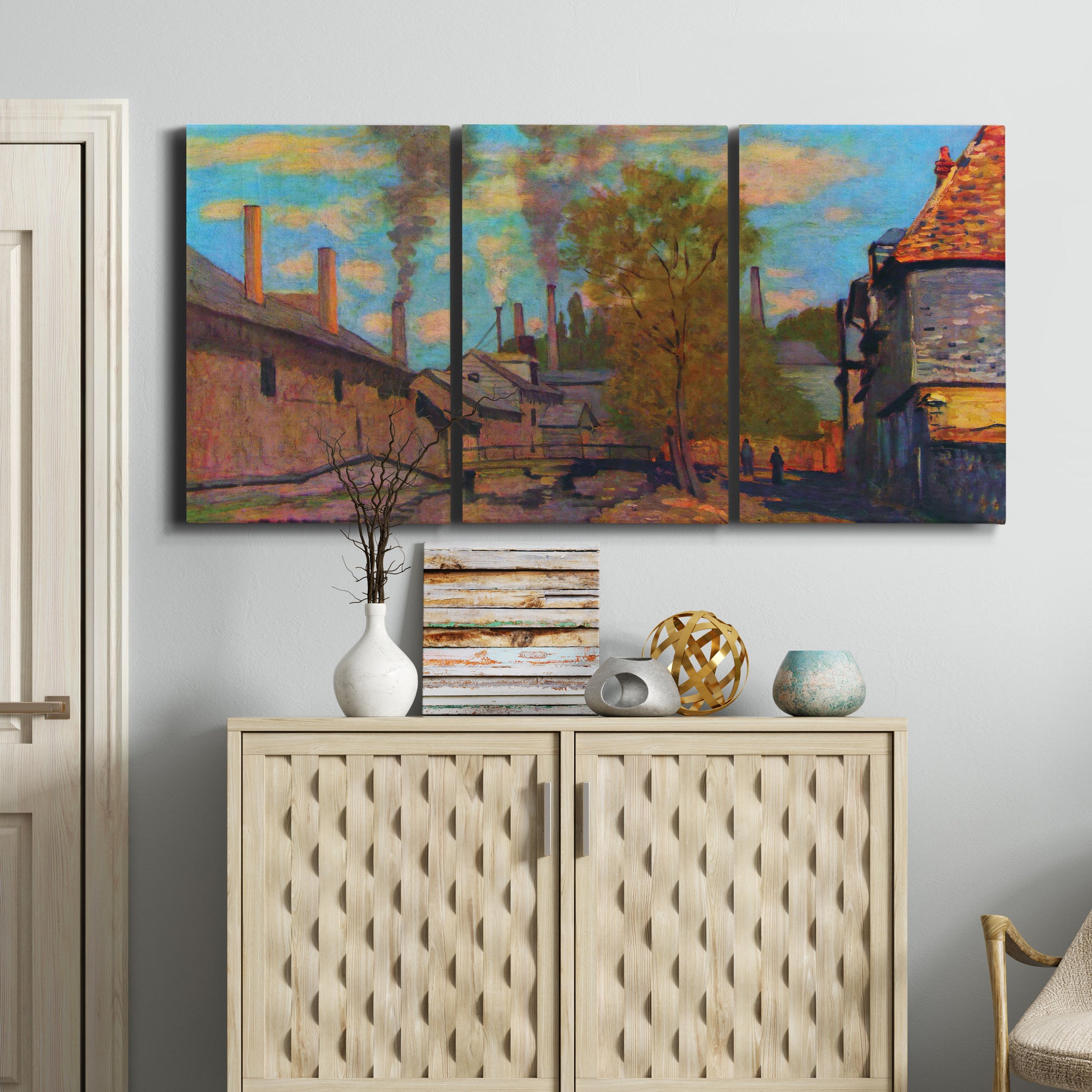 Three-panel canvas wall art featuring wooded stream landscape, displayed above a cabinet in an entryway.