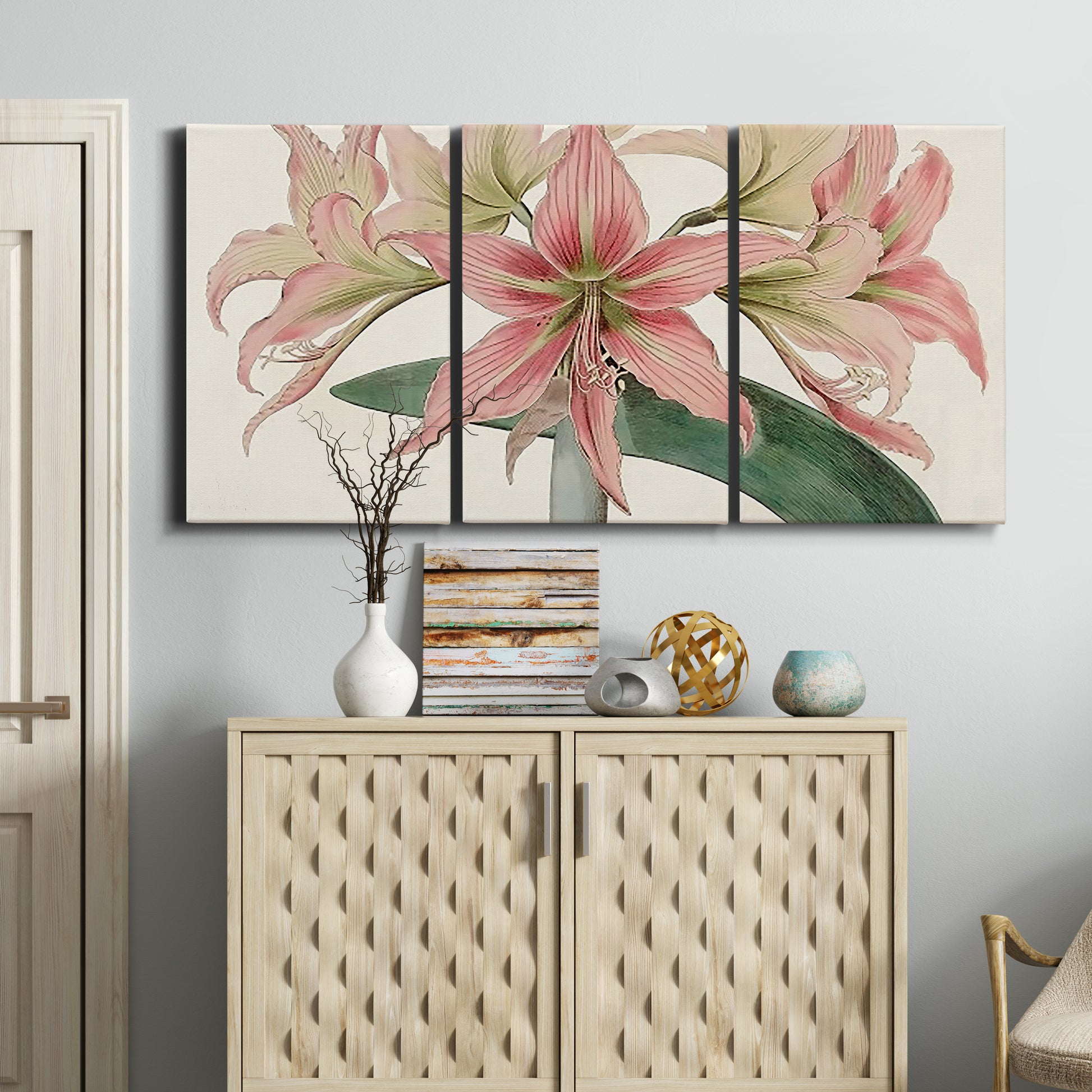 Three-panel canvas wall art featuring vintage styled amaryllis floral study, displayed above a cabinet in an entryway.
