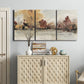 Three-panel canvas wall art featuring autumn landscape with trees and field, displayed above a cabinet in an entryway.