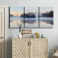 Three-panel canvas wall art featuring misty water landscape photograph, displayed above a cabinet in an entryway.