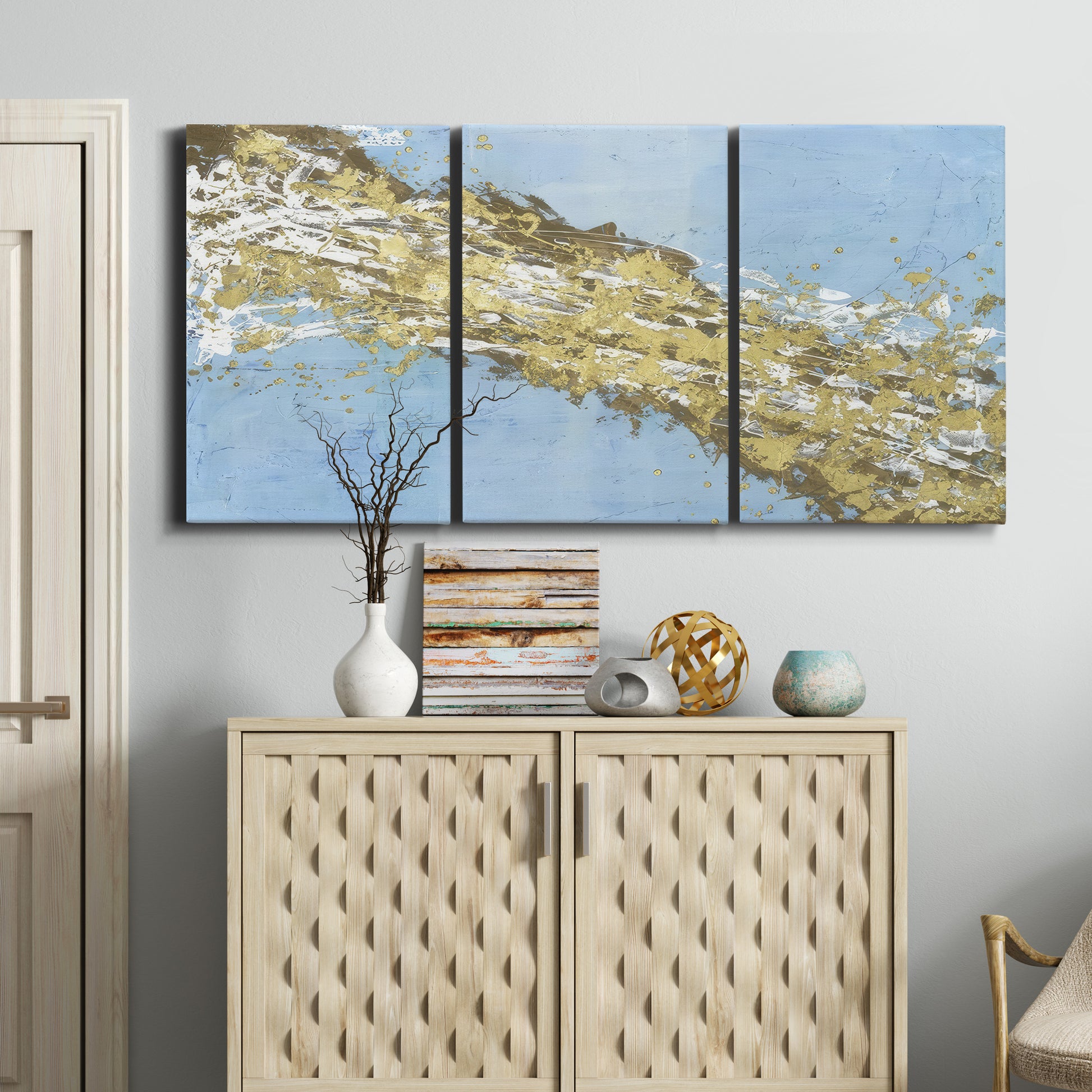 Three-panel canvas wall art featuring , displayed above a cabinet in an entryway.