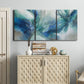 Three-panel canvas wall art featuring subtle abstract light flicker composition, displayed above a cabinet in an entryway.