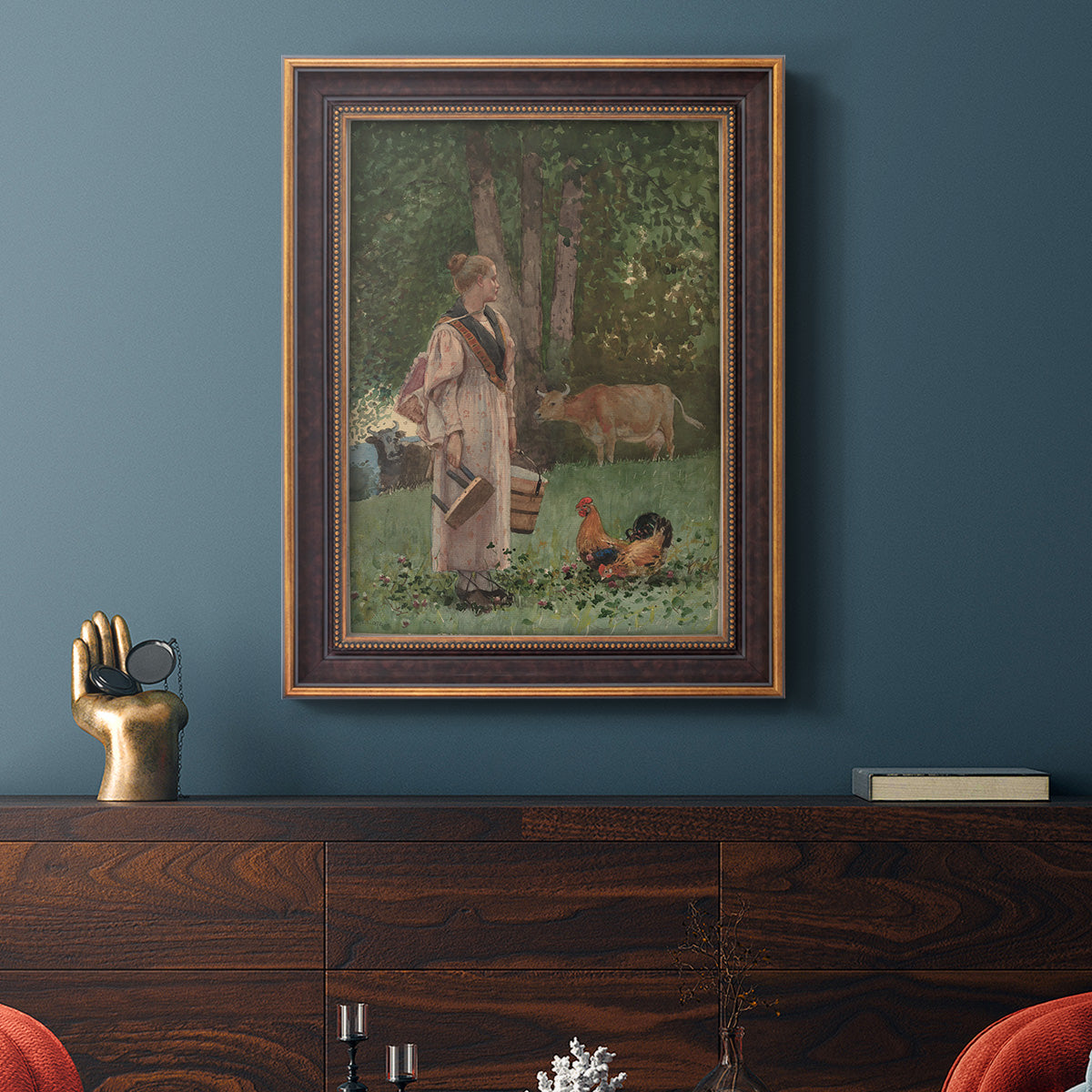 Realist genre scene of a milkmaid by Winslow Homer in an ornate bronzed mahogany wood frame displayed in a dark-toned interior setting.