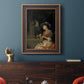 Classical interior scene of a woman weaving flowers by Godfried Schalcken in an ornate bronzed mahogany wood frame displayed in a dark-toned interior setting.