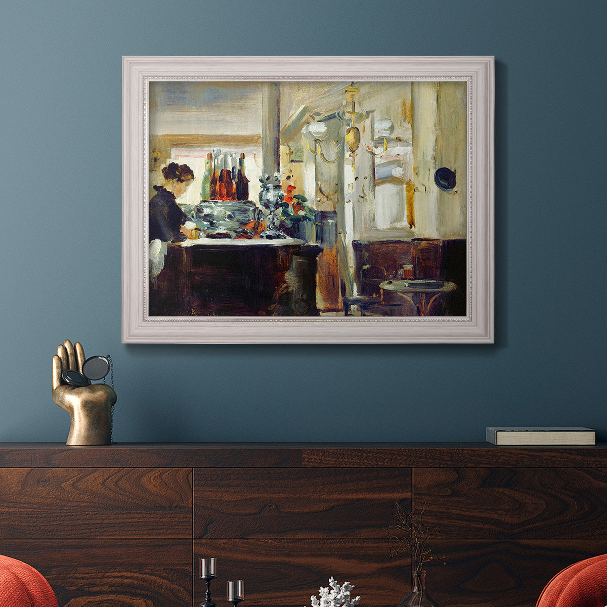 Impressionist café still life scene by Édouard Manet in an ornate weathered white frame displayed in a dark-toned interior setting.
