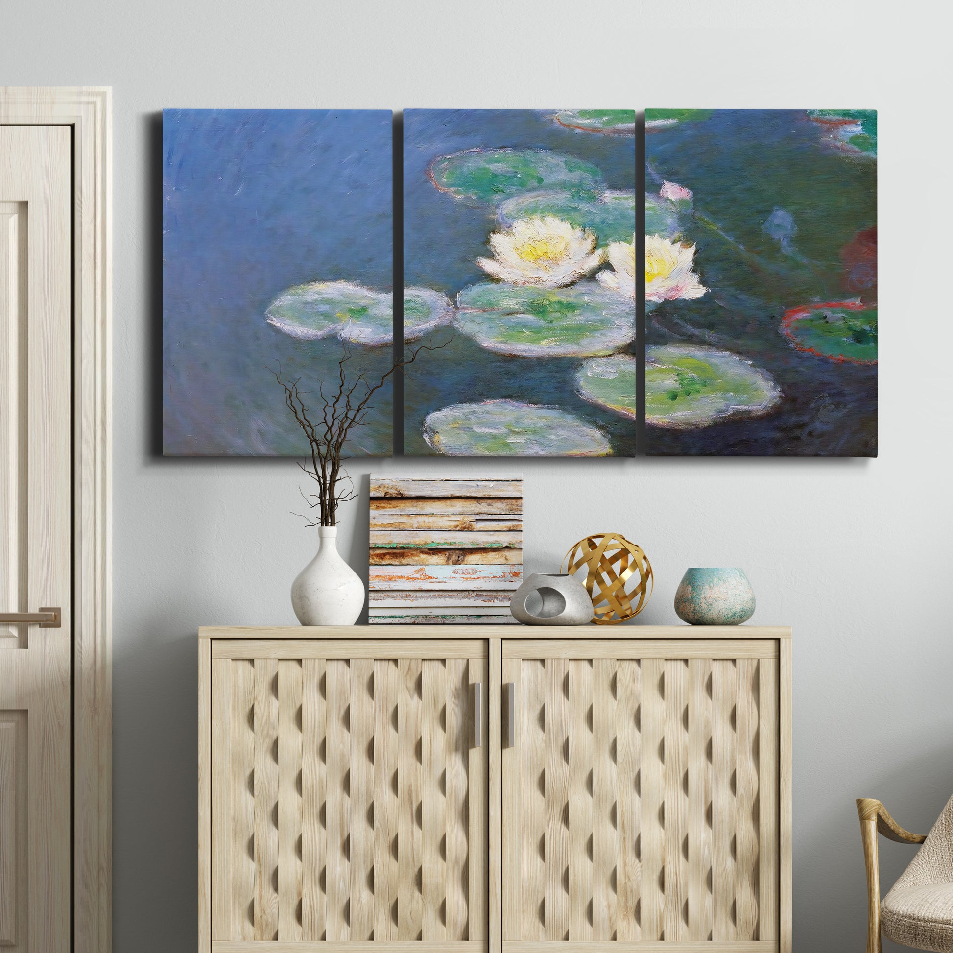 Three-panel canvas wall art featuring water lilies floating on pond, displayed above a cabinet in an entryway.