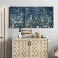 Three-panel canvas wall art featuring dark abstract with rich tonal depth, displayed above a cabinet in an entryway.