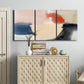 Three-panel canvas wall art featuring playful abstract watercolor shapes, displayed above a cabinet in an entryway.