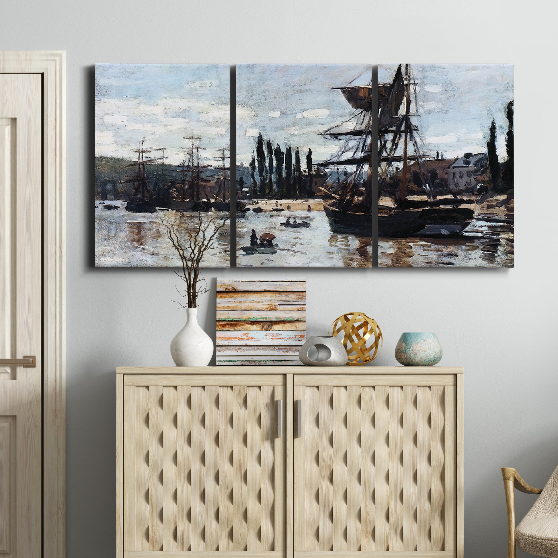 Three-panel canvas wall art featuring harbor scene with boats and quays, displayed above a cabinet in an entryway.