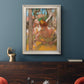 Impressionist ballet dancer composition by Edgar Degas in an ornate champagne frame displayed in a dark-toned interior setting.