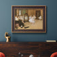 Impressionist dance class interior scene by Edgar Degas in an ornate bronzed mahogany wood frame displayed in a dark-toned interior setting.