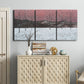 Three-panel canvas wall art featuring winter sunset snowfall landscape, displayed above a cabinet in an entryway.