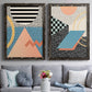 Set of two black barnwood framed canvas prints depicting paired retro graphic abstracts with checkerboards stripes squiggles peach blue black and mint shapes above a sofa in a contemporary living room.