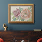 Modern peony floral drawing in an ornate antique gold frame displayed in a dark-toned interior setting.