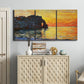 Three-panel canvas wall art featuring arched coastal cliff above sea, displayed above a cabinet in an entryway.