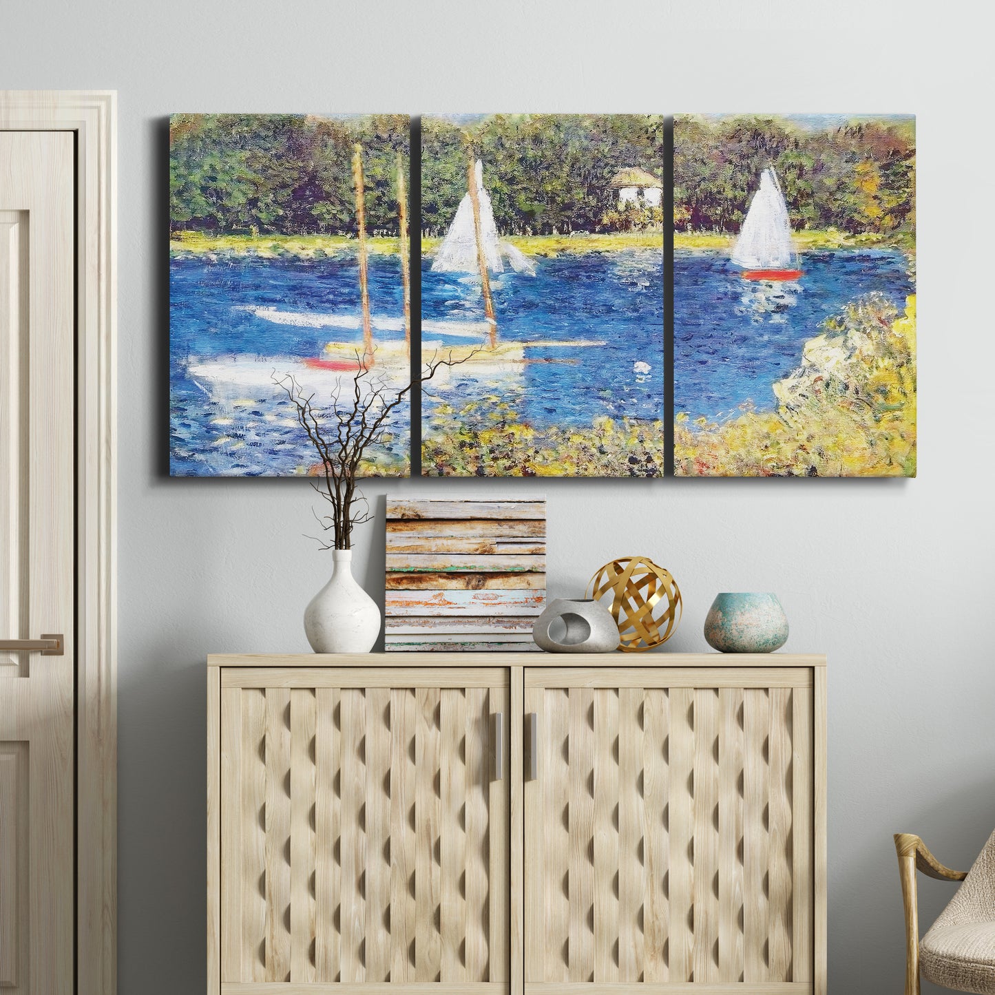 Three-panel canvas wall art featuring river scene with reflections, displayed above a cabinet in an entryway.