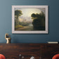 Romantic autumn landscape along the Hudson River by Thomas Doughty in an ornate weathered white frame displayed in a dark-toned interior setting.