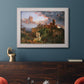 Romantic allegorical landscape painting by Jasper Francis Cropsey in an ornate weathered white frame displayed in a dark-toned interior setting.